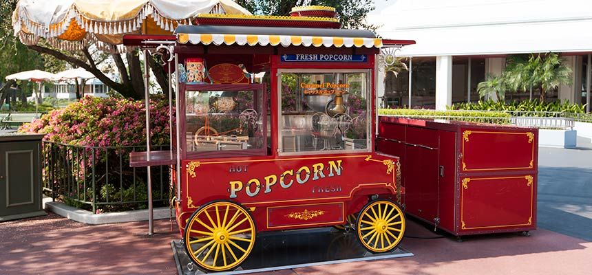 Disneyland popcorn cart with scent diffusers releasing fresh popcorn aroma - scent marketing example
