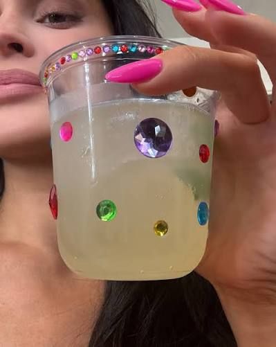 Rhinestone-covered drink cup, part of Kylie Jenner's whimsy maxxing 29th birthday celebration